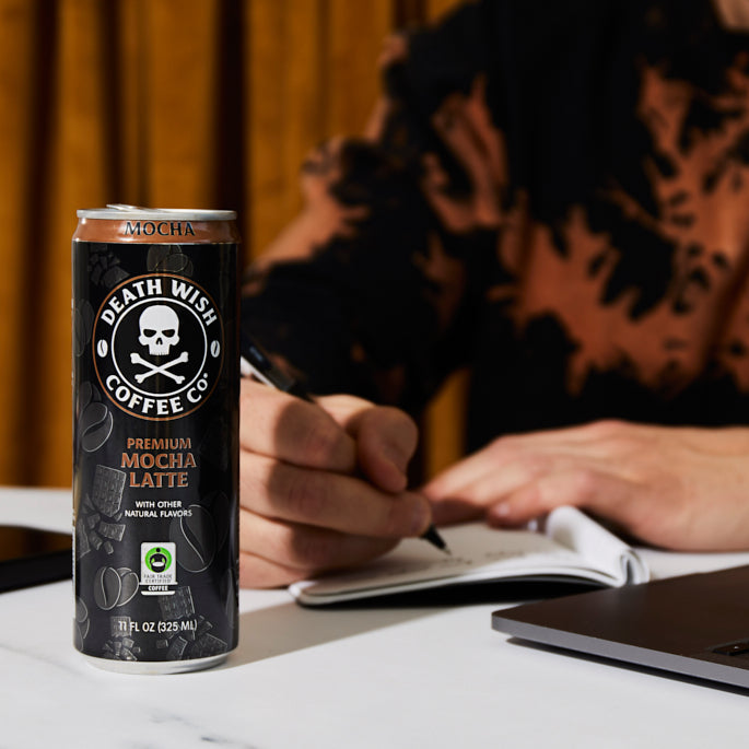 Taking notes fueled by the Death Wish Coffee Premium Mocha Latte.