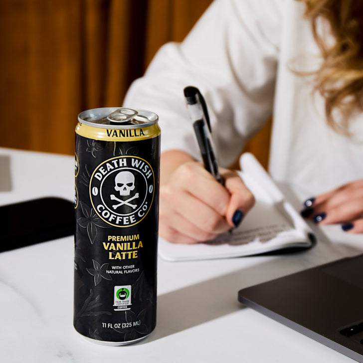 Taking notes fueled by the Death Wish Coffee Premium Vanilla Latte.