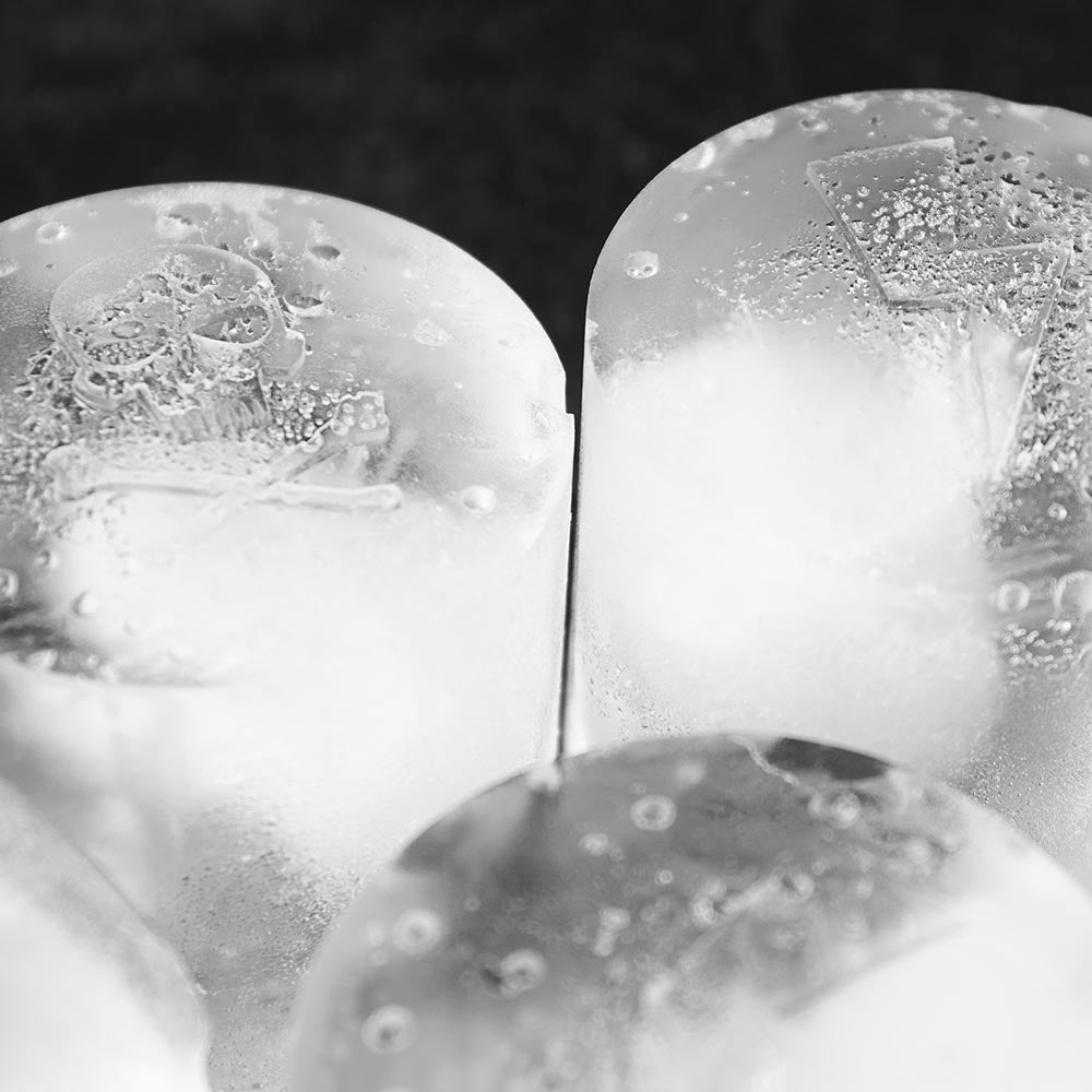 A macro shot of ice cubes made with the Death Wish Coffee Brain Freeze Ice Molds.