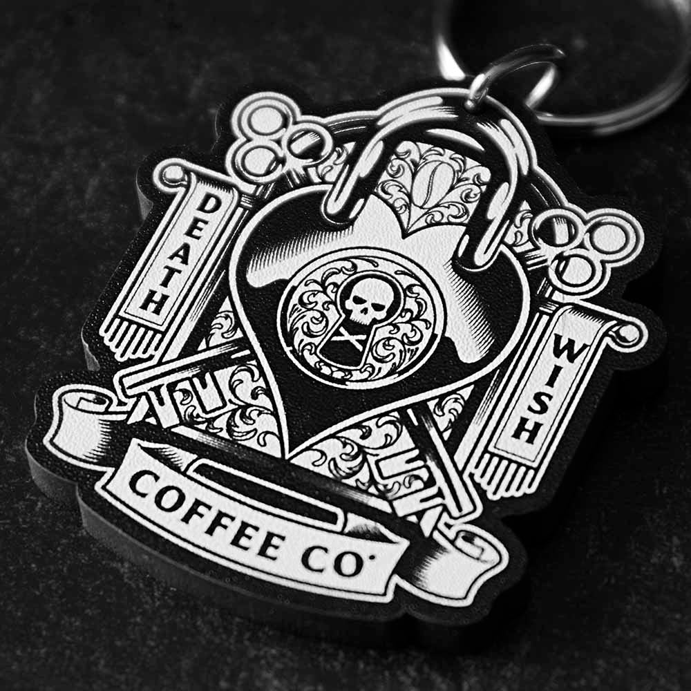 A close up view of the Death Wish Coffee Lock It Down Keychain.