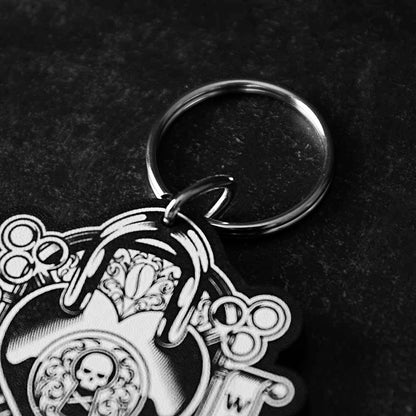 A close up view of the split ring of the Death Wish Coffee Lock It Down Keychain.