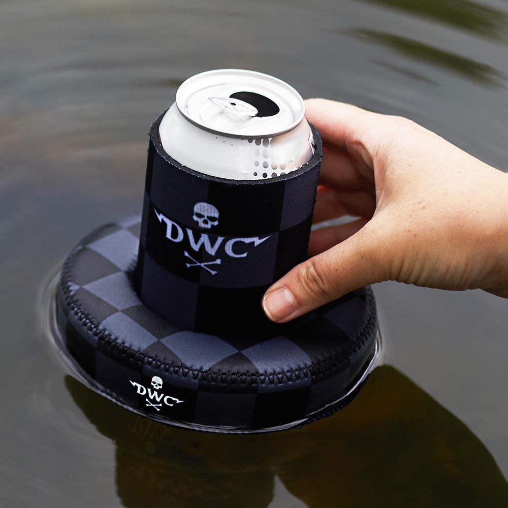 A hand grabbing a can out of the Death Wish Coffee Float Away Koozie Set.