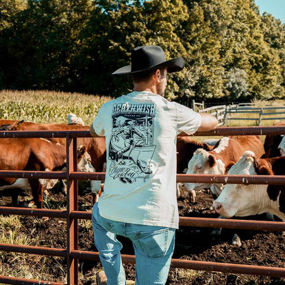 Looking over the cows in the Death Wish Coffee Chemex Cowboy Tee.