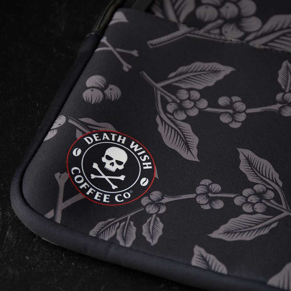 The logo detail of the Death Wish Coffee Let It Bloom Laptop Sleeve.